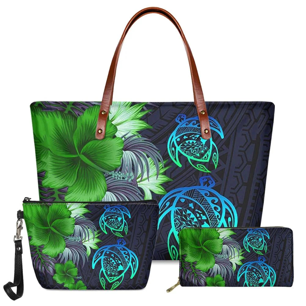 3-piece handbag set with Polynesian tribal turtle and green floral print on black, featuring brown leather shoulder straps.