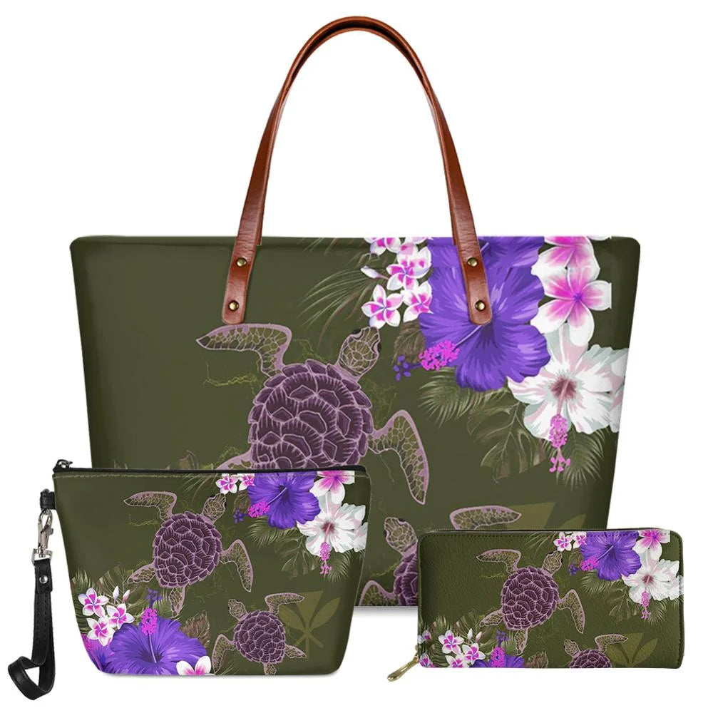 3-piece olive green handbag set featuring purple sea turtle and tropical hibiscus floral print with brown leather handles.