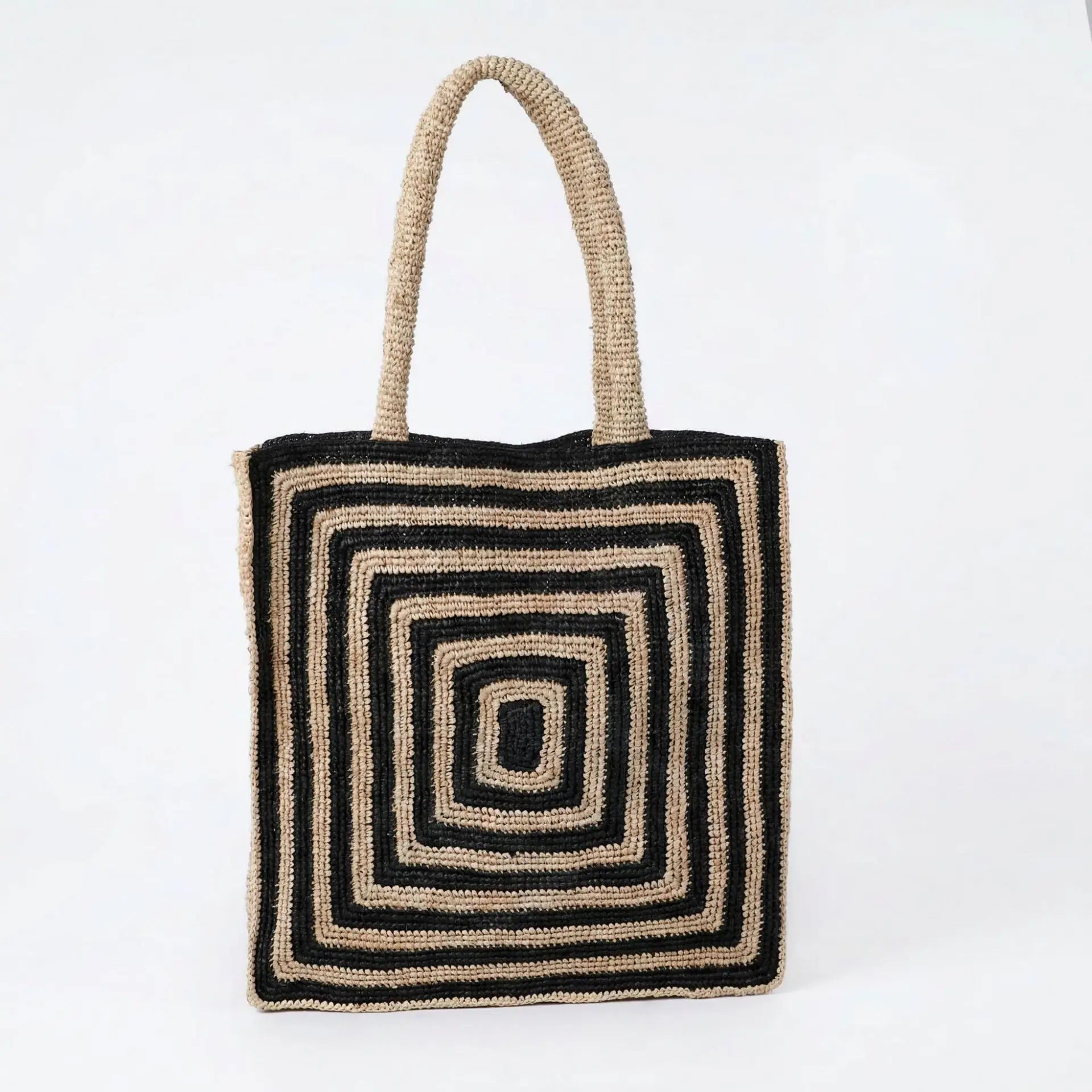 Black and beige crochet tote bag with geometric square pattern, woven lightweight material, ideal for beach or daily use.