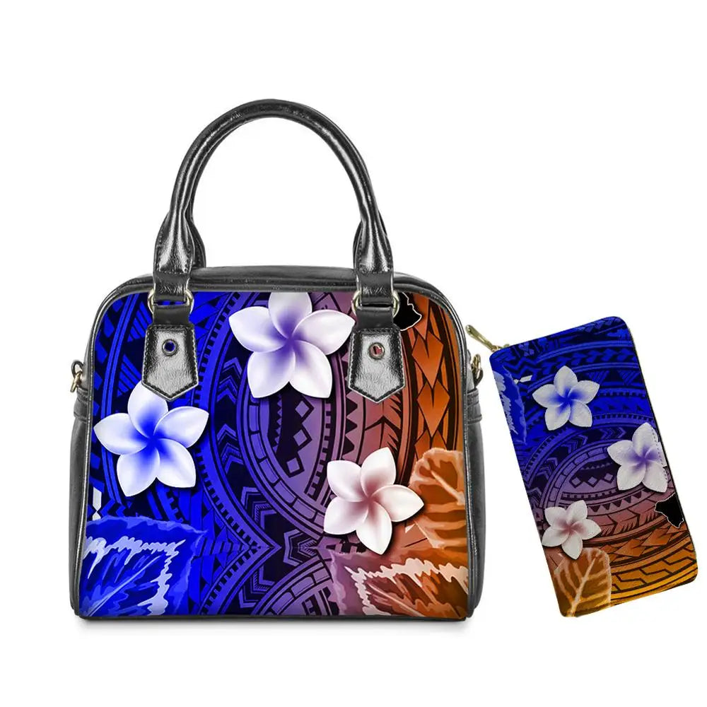 Colorful American Samoa Polynesian tribal print leather handbag and matching wallet set with plumeria flower accents.