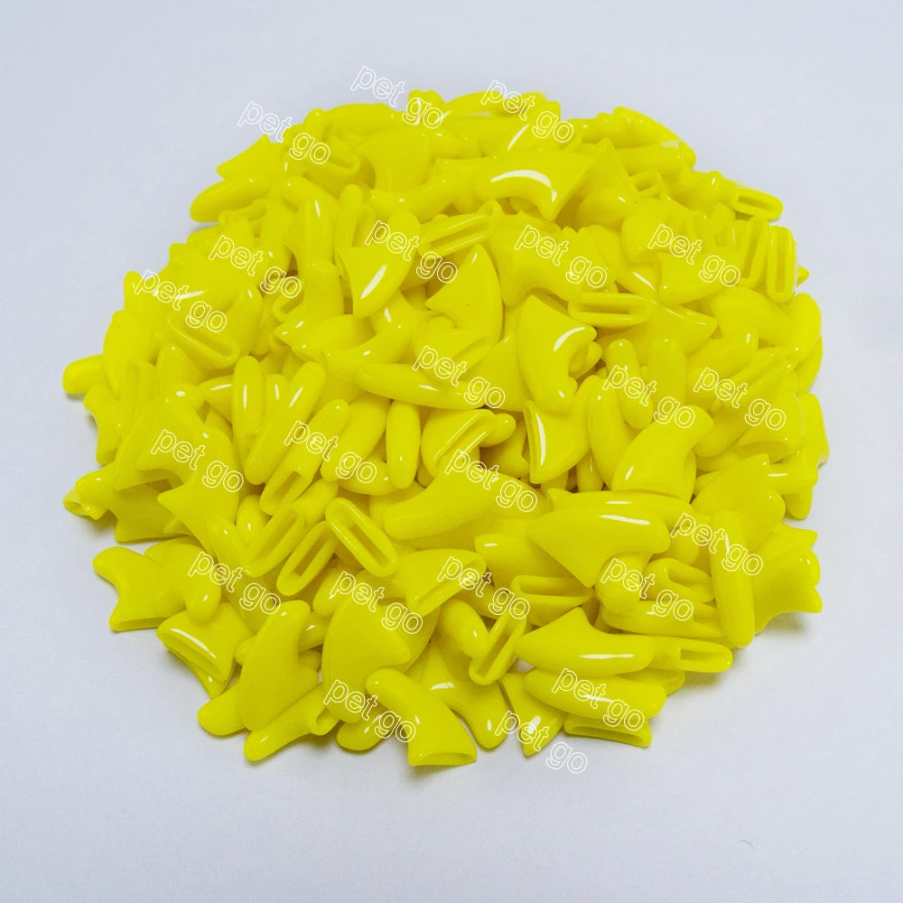 Bright yellow soft cat nail caps for claw protection, 20-piece set includes adhesive glue, available in sizes XS-L.