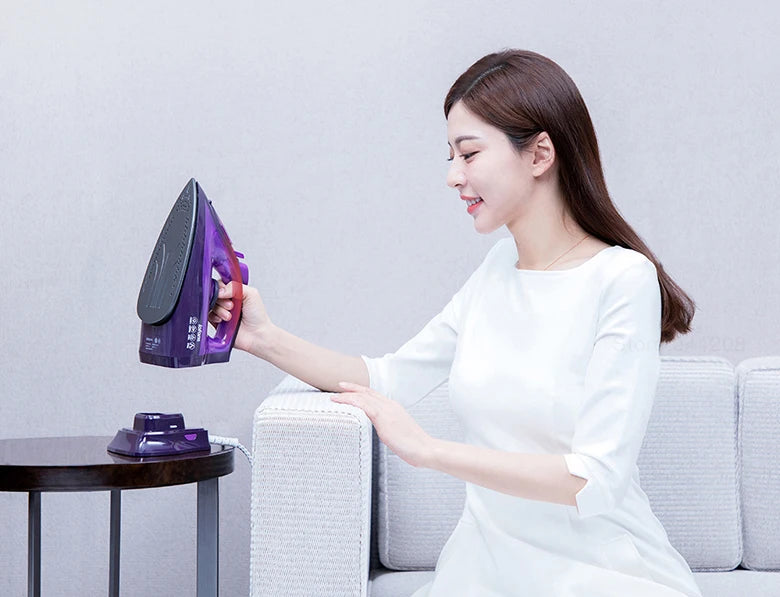 Tidesmit Lofans YD-012V cordless steam iron showing water tank and ergonomic handle for easy garment steaming