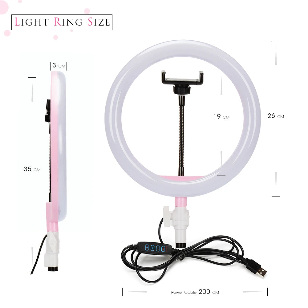 Pink 26cm LED ring light with a center phone mount, flexible arm, and 200cm USB power cable for photography or video.