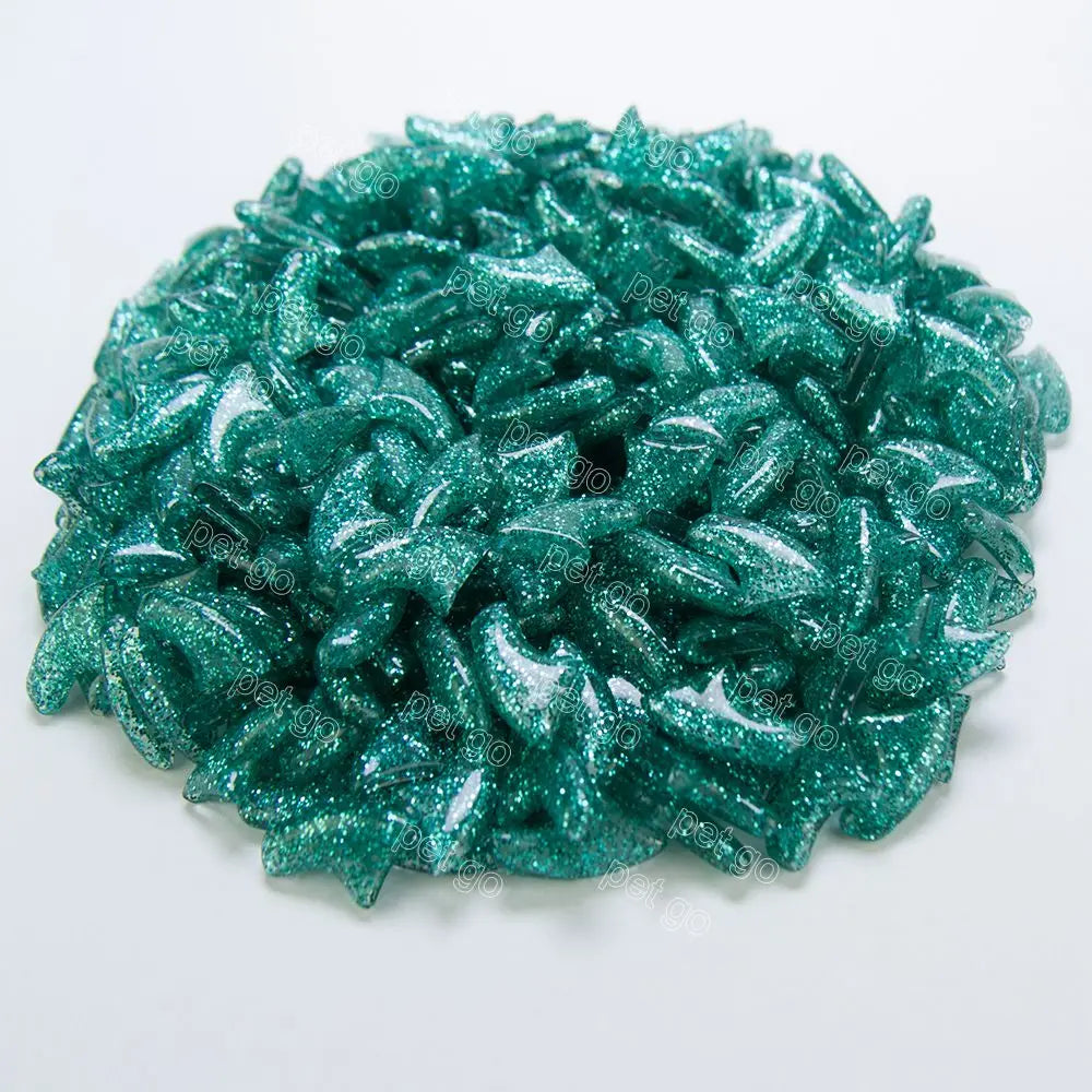 Sparkly green soft cat nail caps for scratch-free paws. 20-pack of fashionable, comfortable claw covers with glue.