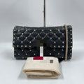 Pre-owned black quilted leather designer shoulder bag with silver rivet studs and a metal chain strap.