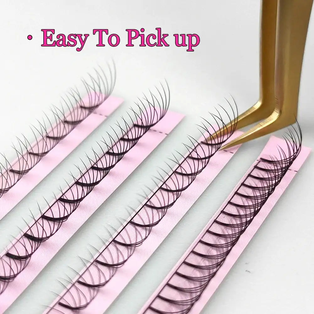 Black, short-stem Russian volume lash fans on pink adhesive strips being lifted by gold tweezers.