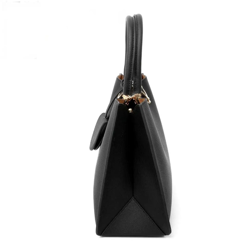 Black designer genuine leather tote bag with top handle, structured sides, and gold hardware zipper detailing.