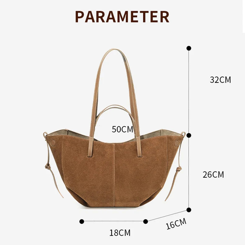 Brown suede designer tote bag with large capacity, dual straps, and side tie details for a luxury shoulder handbag.