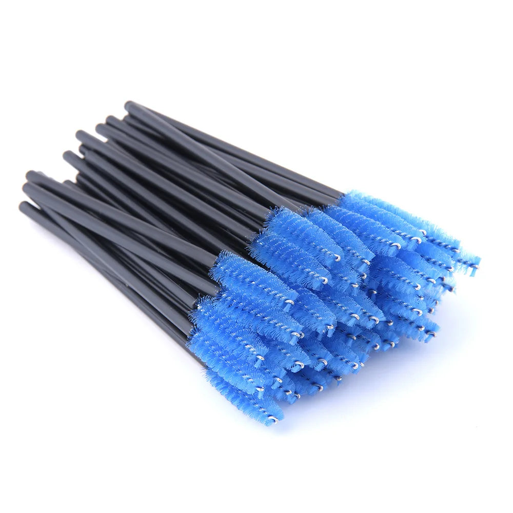 A bundle of disposable eyelash brushes with black plastic handles and bright blue spiral bristles.