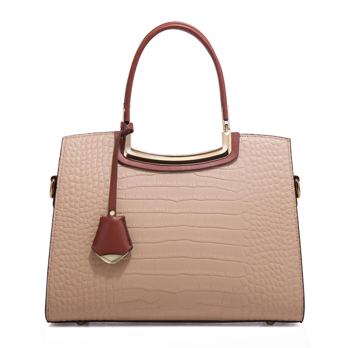 Beige crocodile-embossed leather tote bag with brown handles, gold metal trim, and a decorative leather pendant tag.