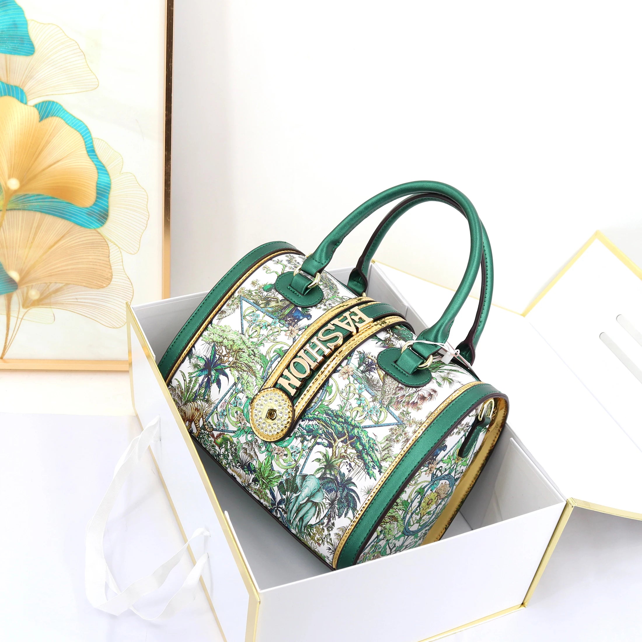 29cm green fashion trunk handbag for women with jungle print, gold hardware, and top handle in a presentation box.