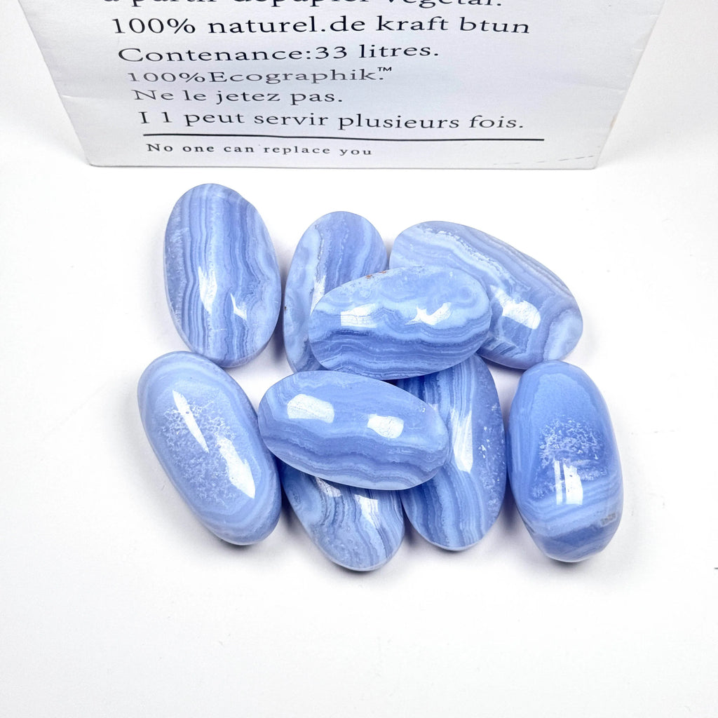 Assorted blue lace agate palm stones, oval tumbled crystals with wavy blue stripes