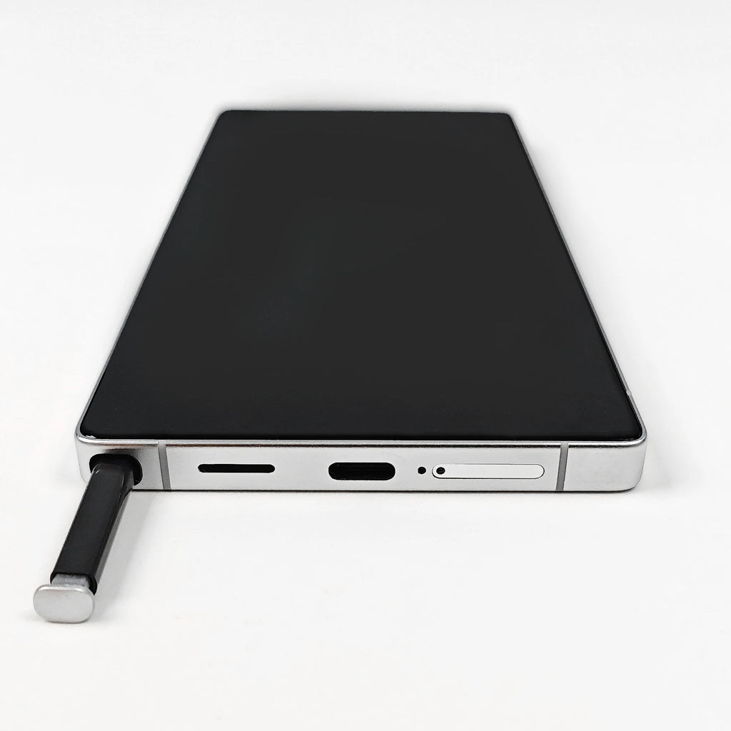 Close up of S25 Ultra smartphone showing metallic frame, side volume buttons, and USB-C port in premium finish.