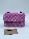 Bottega Veneta purple velvet woven shoulder bag with chain strap and snakeskin trim. Luxury designer handbag.