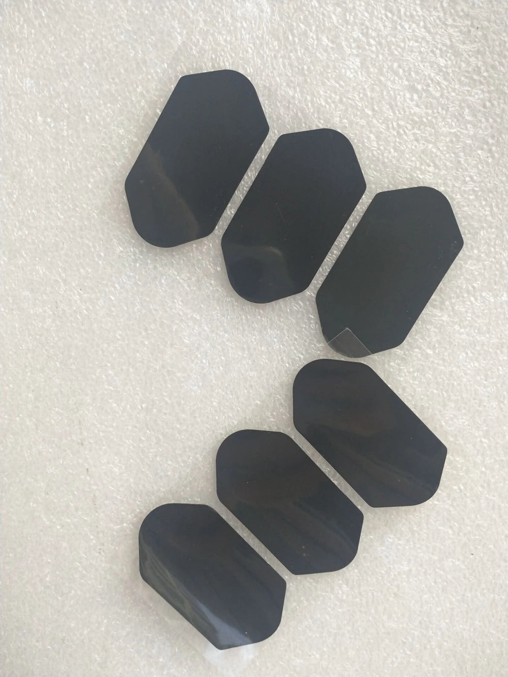 Black replacement film stickers for 3D 4D HIFU cartridge, hexagonal adhesive pads for beauty equipment maintenance.