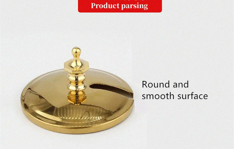 Polished gold stainless steel coffee or tea pot replacement lid with a smooth round surface and decorative handle.