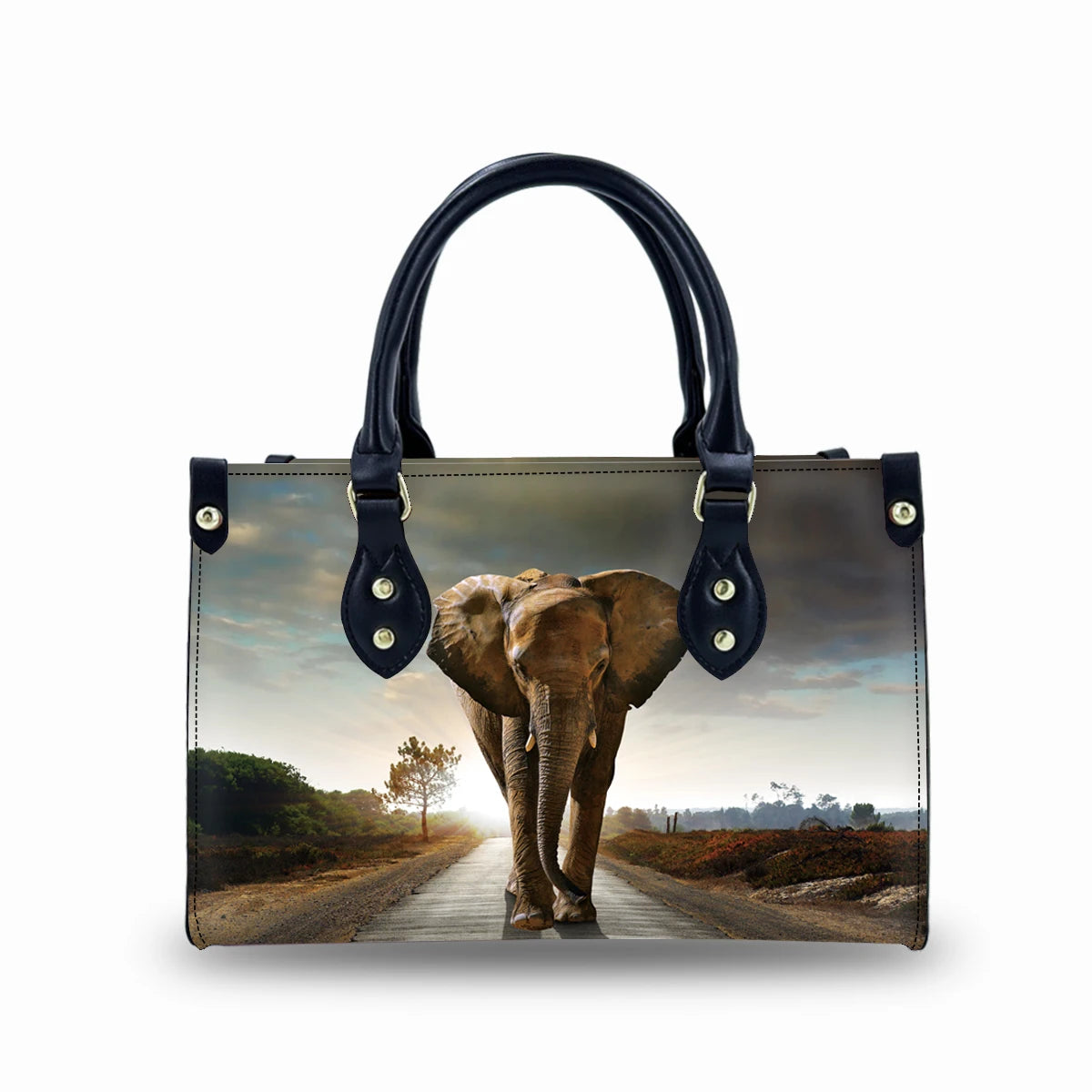 Vintage leather trunk handbag featuring an elephant on a road print, black handles, and gold hardware detailing.
