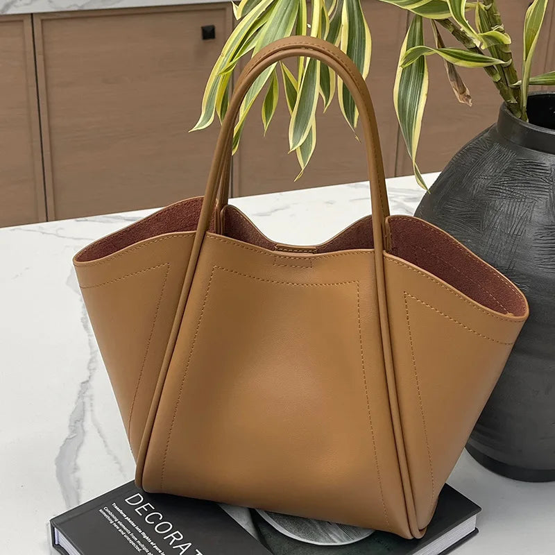2025 Autumn Winter High-End Niche Genuine Leather Wing Bag Large Capacity Commuter Shoulder Promotional Drawstring Sportpacks