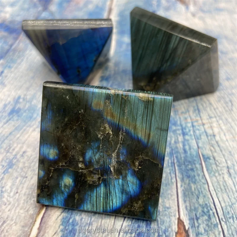 Dark blue labradorite crystal block with metallic blue sheen and gold-toned inclusions