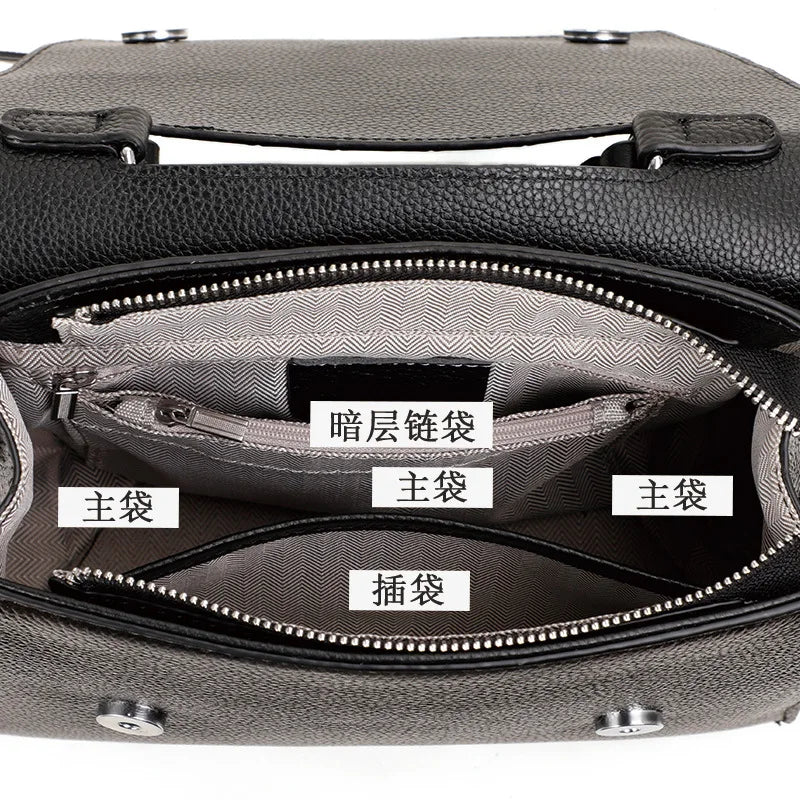 Black leather designer crossbody handbag interior with multiple compartments, zip pockets, and fabric lining.