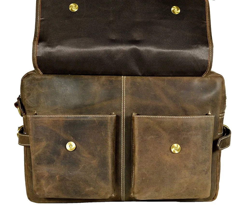 Handmade rustic brown leather messenger bag with dual front pockets, brass snap closures, and laptop-friendly design.