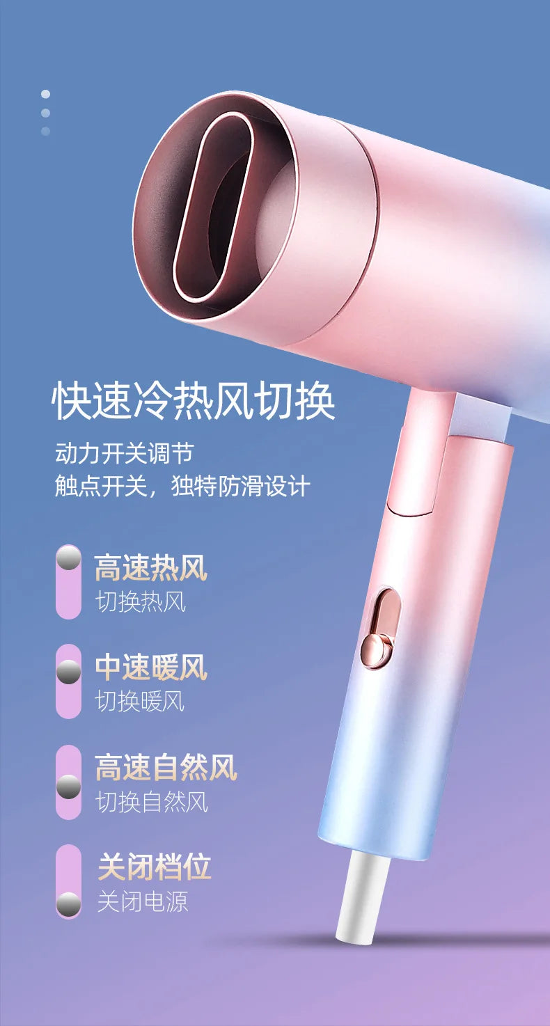 Portable pink and blue gradient mini hair dryer with ionic technology, foldable design, and adjustable heat settings.