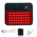 Red and infrared light therapy belt with 60 glowing LEDs, power button, USB cable, strap, and wall plug adapter.