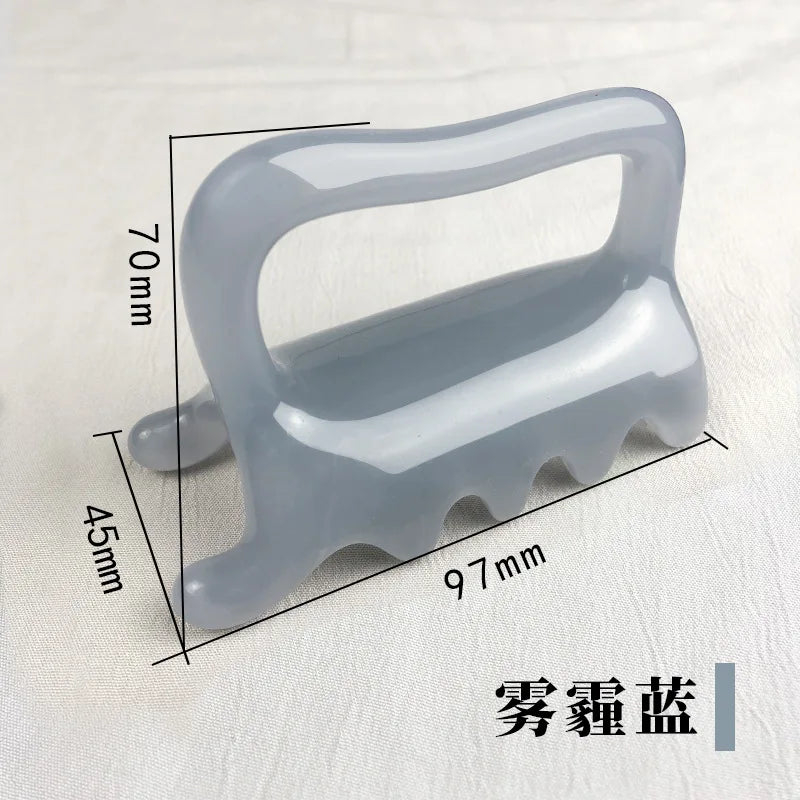 Grey stone massage tool with handle and four rounded prongs. Measures 97x70x45mm, for deep tissue muscle therapy.