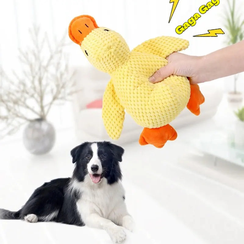 Durable yellow duck plush dog toy for interactive play, teeth cleaning, and boredom relief for pets.
