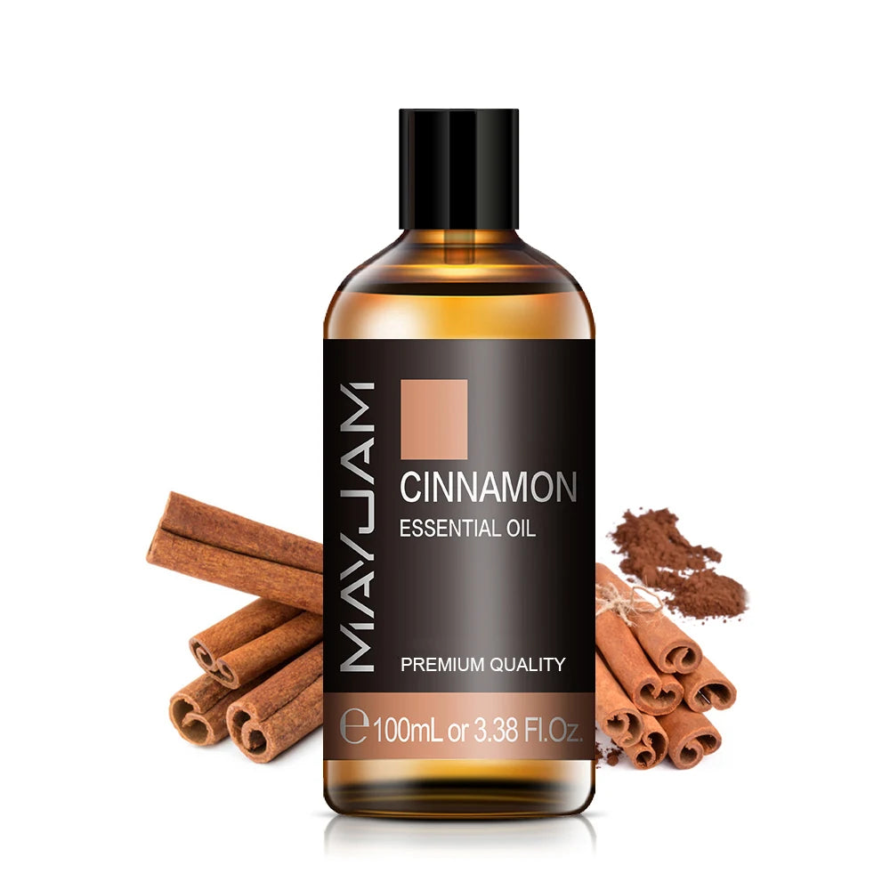 100ml cinnamon essential oil bottle with black cap and amber label for diffusers.