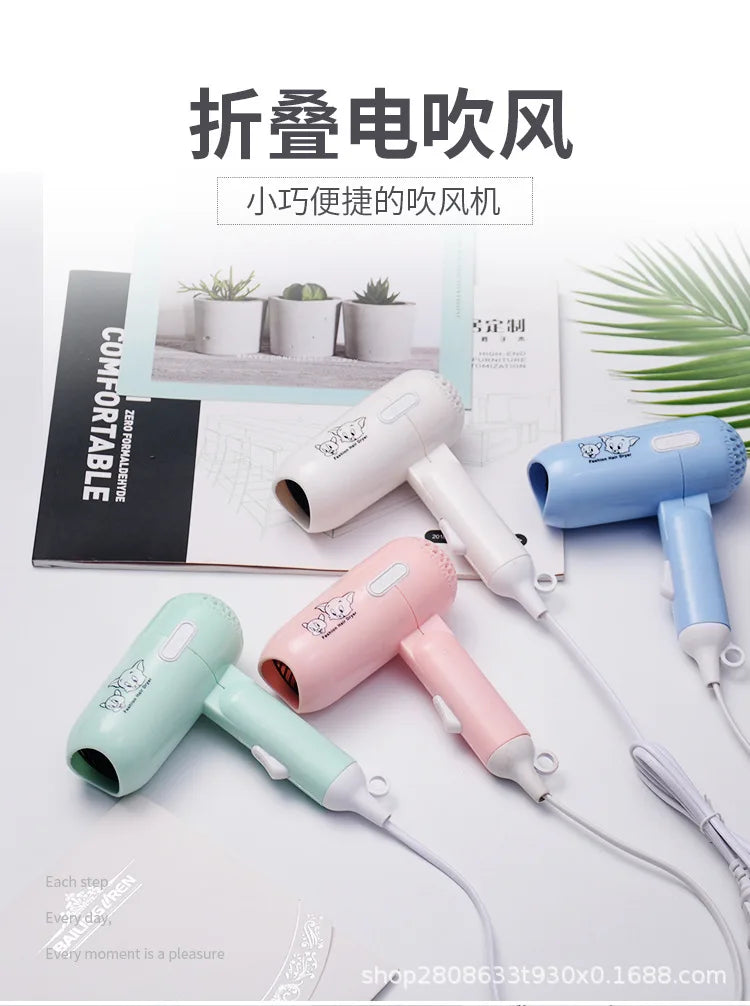 Mini folding hair dryers in pastel colors with cartoon print, 400W low-power travel design for easy styling.