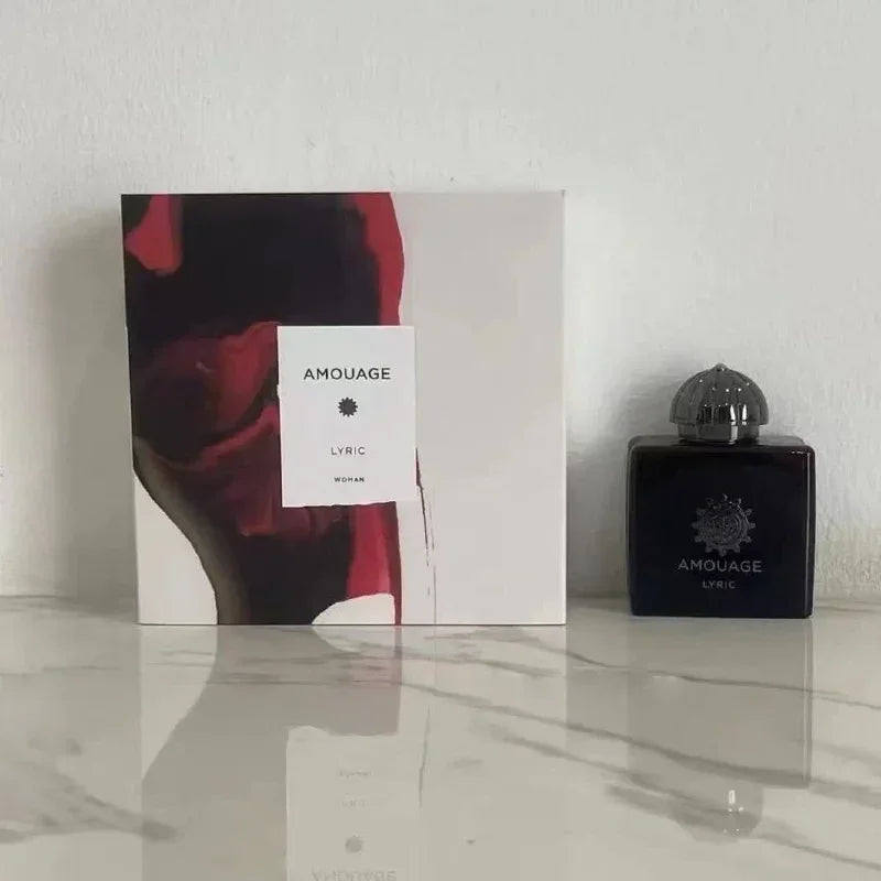 Amouage Lyric Woman EDP: 100ml luxury woody oriental perfume in a signature square bottle with an ornate dome cap.