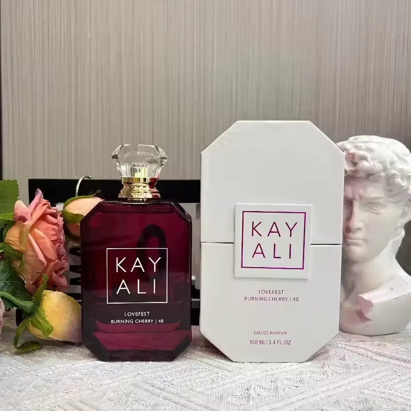 Kayali Lovefest Burning Cherry 100ml EDP: luxury fruity floral perfume in a geometric glass bottle. Unisex fragrance.