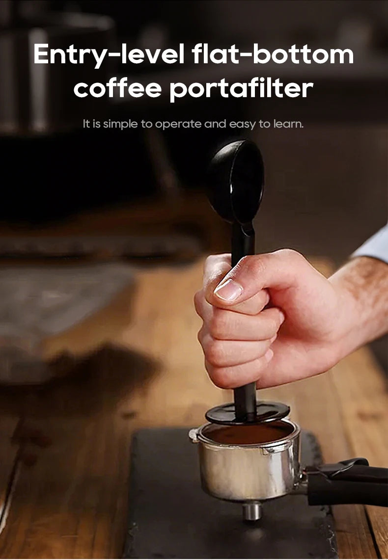 Black plastic coffee tamper used to press coffee grounds in a metal flat-bottom portafilter basket for espresso.