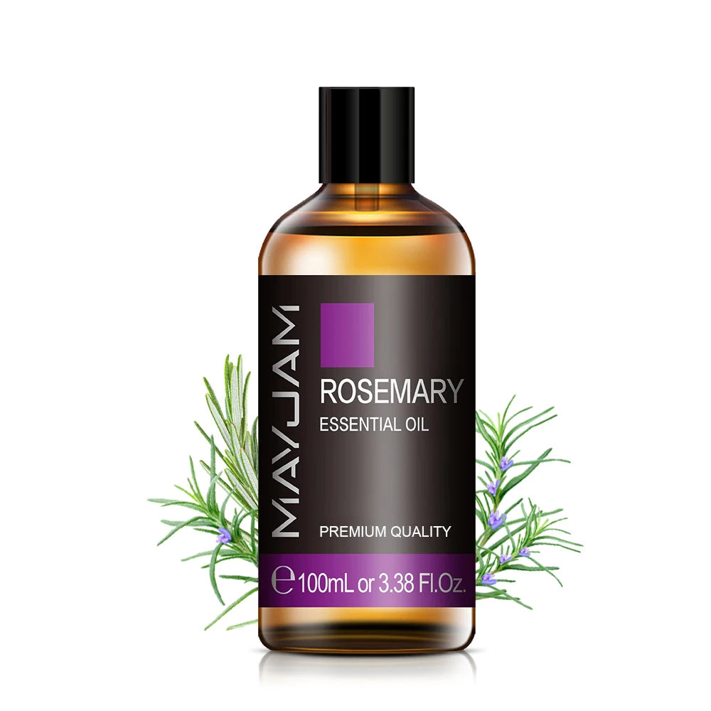 Rosemary essential oil bottle with herb sprigs, amber glass 100ml and gold cap