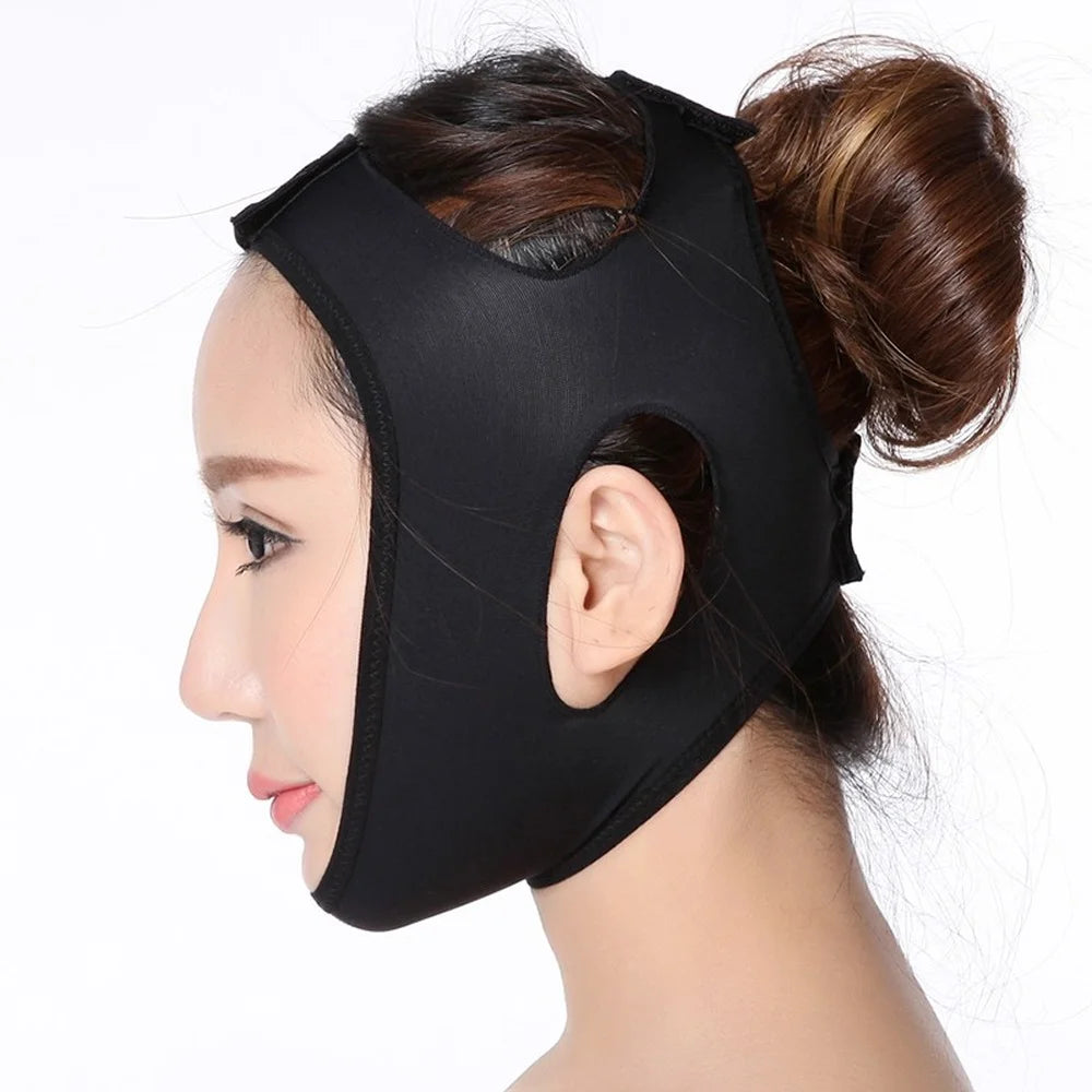 Profile view of a woman wearing a black elastic V-line face slimming bandage with cutouts for ears.