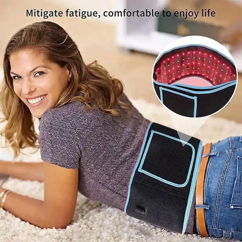 A woman wears a black LED therapy belt with blue trim, featuring bright red light nodes for pain relief.