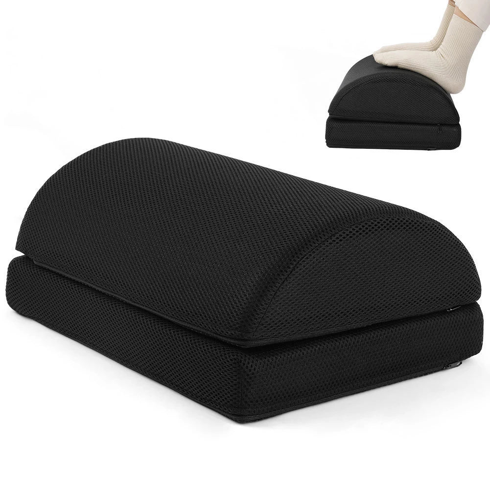 Black ergonomic under desk foot rest with adjustable height, mesh cover, and foam cushion for office or gaming chairs.