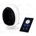 White smart facial skin analysis machine with tablet screen for AI beauty assessment and anti-aging skin scanning.