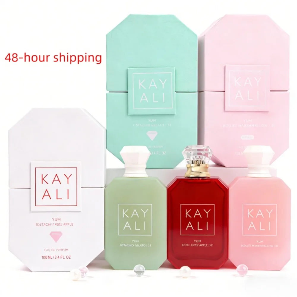 Kayali Yum Eau de Parfum collection: 100ml unisex fragrance bottles featuring pistachio, apple, and marshmallow notes.