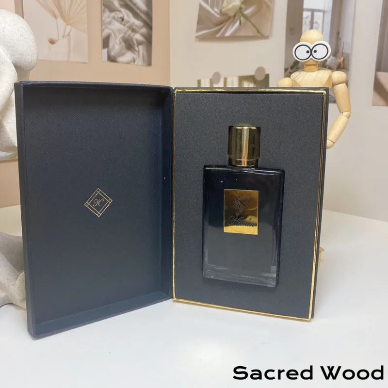 Kilian Sacred Wood EDP: Unisex woody oriental 50ml perfume in an elegant black rectangular bottle with gold cap.