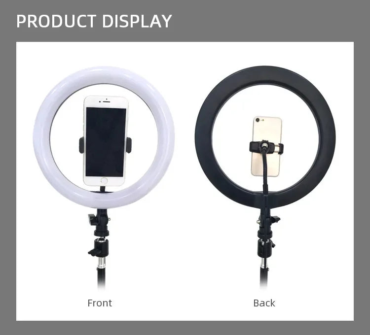 White and black circular ring lights on adjustable stands, each featuring a centered smartphone mount for photography.