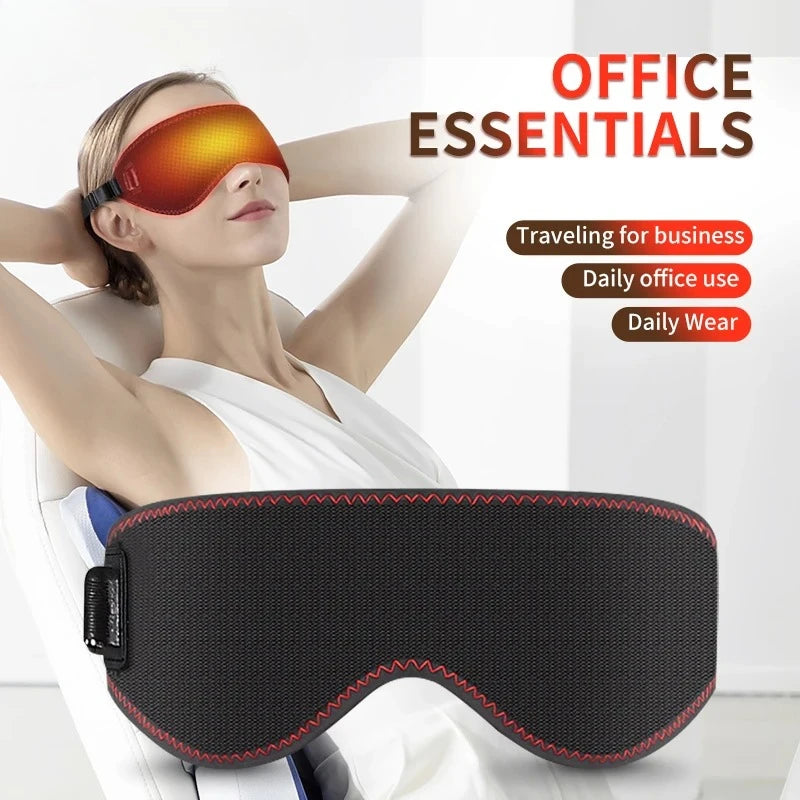 A woman wearing a black, fabric heated eye mask with red stitching, showing a warm glowing light effect on the eyes.
