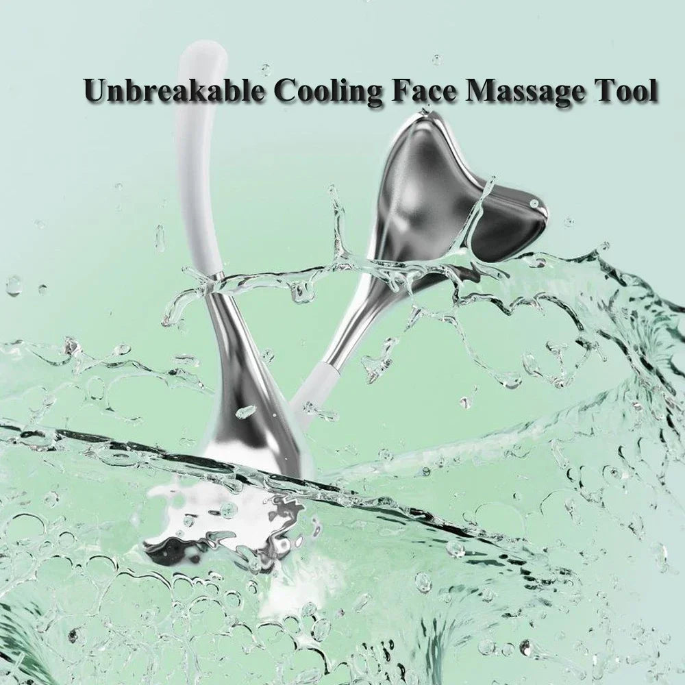 Cooling face massage tool with a silver heart-shaped metal head and white handle, shown submerged in splashing water.