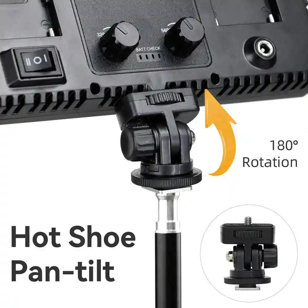 Black plastic hot shoe pan-tilt mount with 180-degree rotation, attached to a light panel for adjustable positioning.