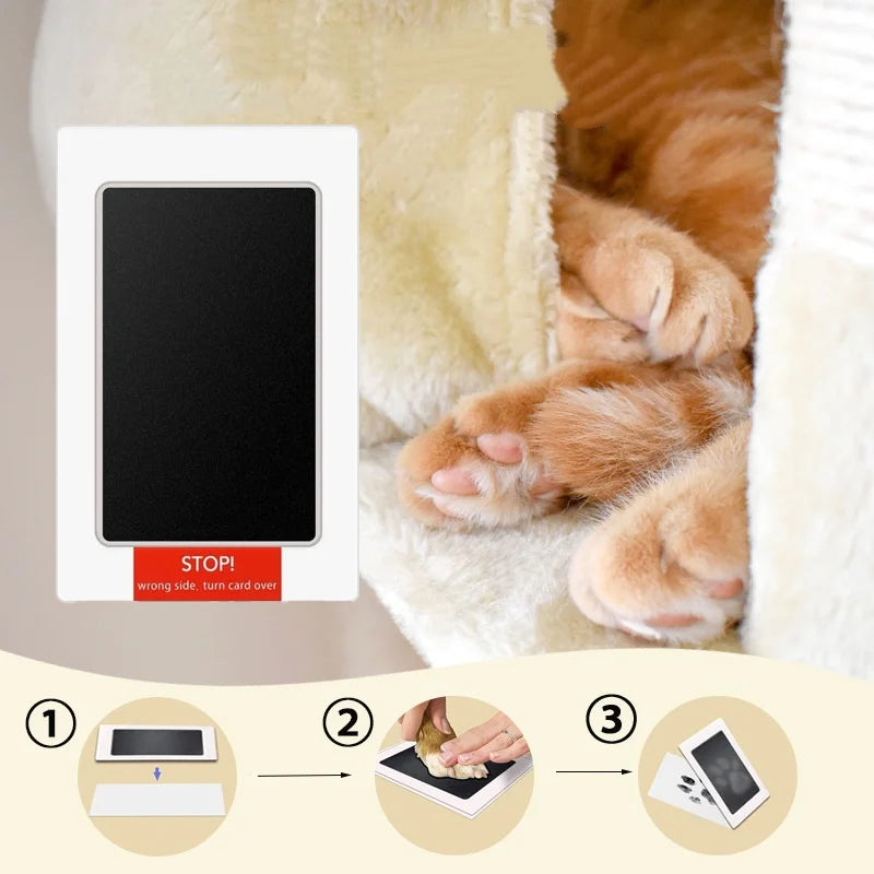 Non-toxic inkless ink pad kit for capturing safe pet paw prints or newborn baby handprints without touching ink.