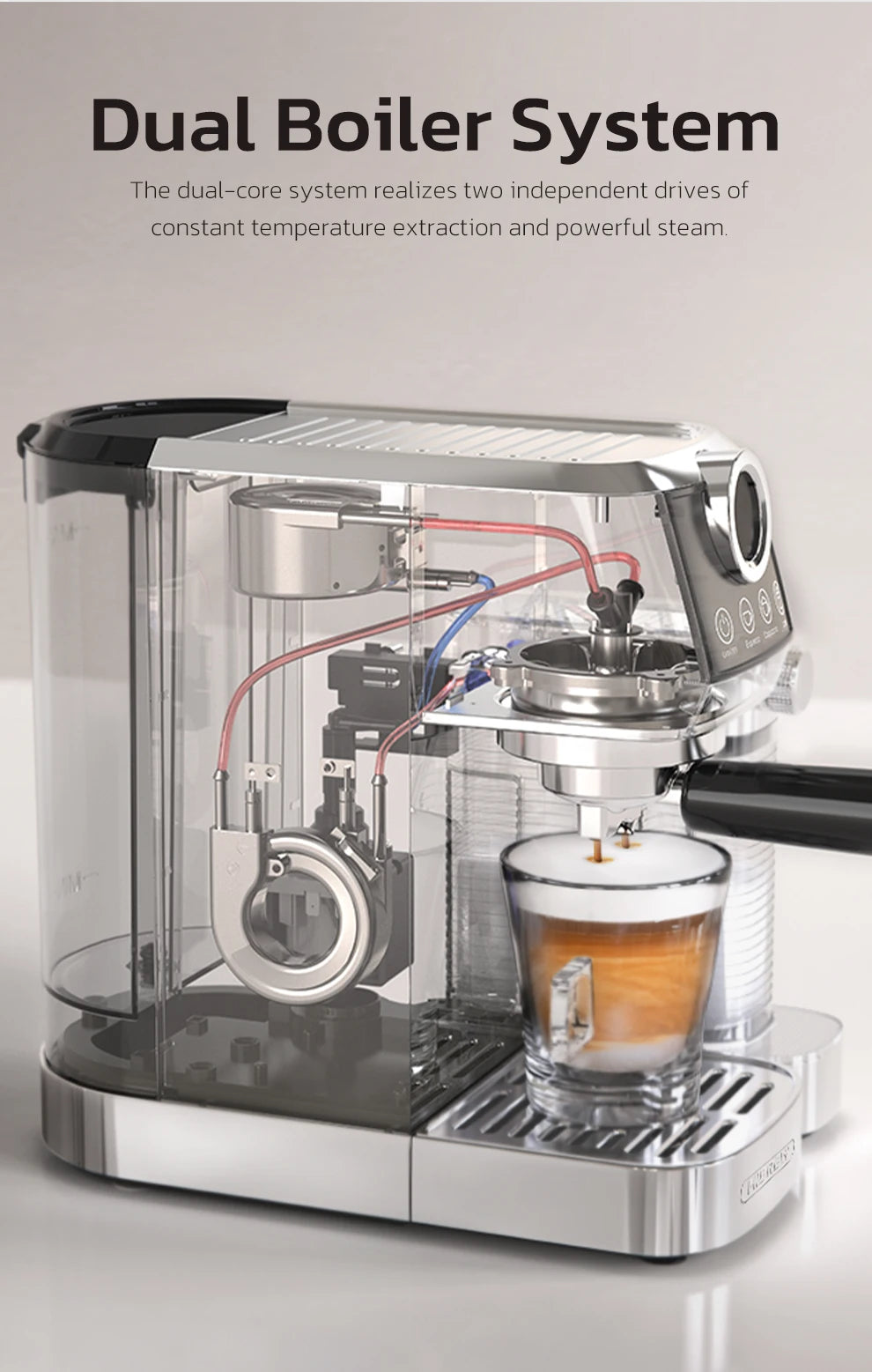 Transparent stainless steel espresso machine with dual boiler system brewing coffee into a glass cup.