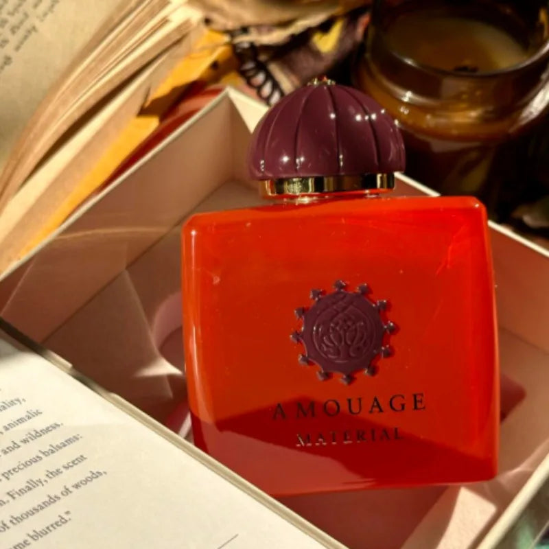 Amouage Material EDP: Red square bottle, floral oriental scent. A sophisticated, long-lasting luxury perfume for women.
