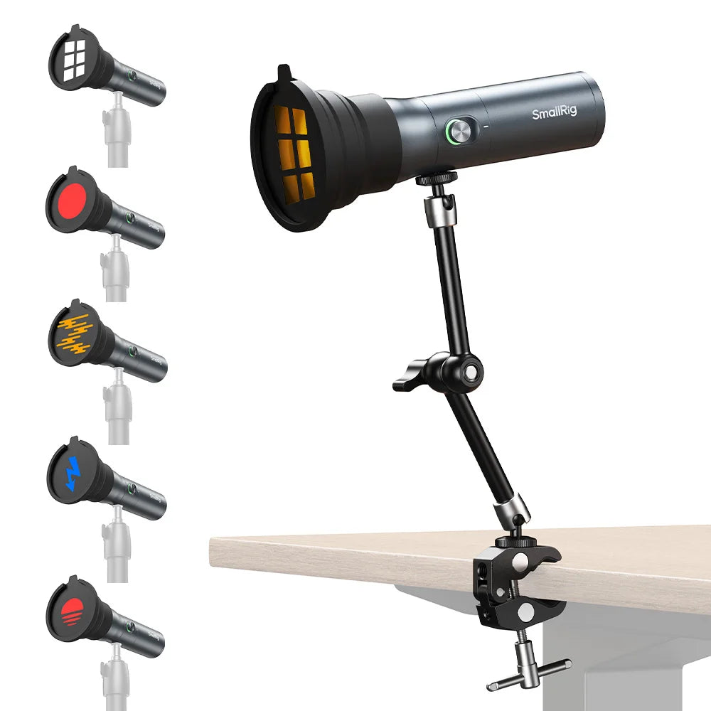 Portable LED video light with adjustable arm, table clamp, and various colored magnetic filter gobo inserts.