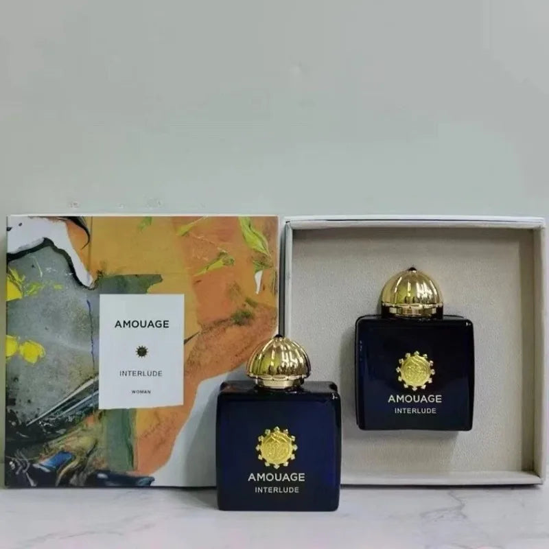Amouage Interlude Woman EDP: Luxury woody oriental Arabic perfume in signature deep blue square bottle with gold cap.